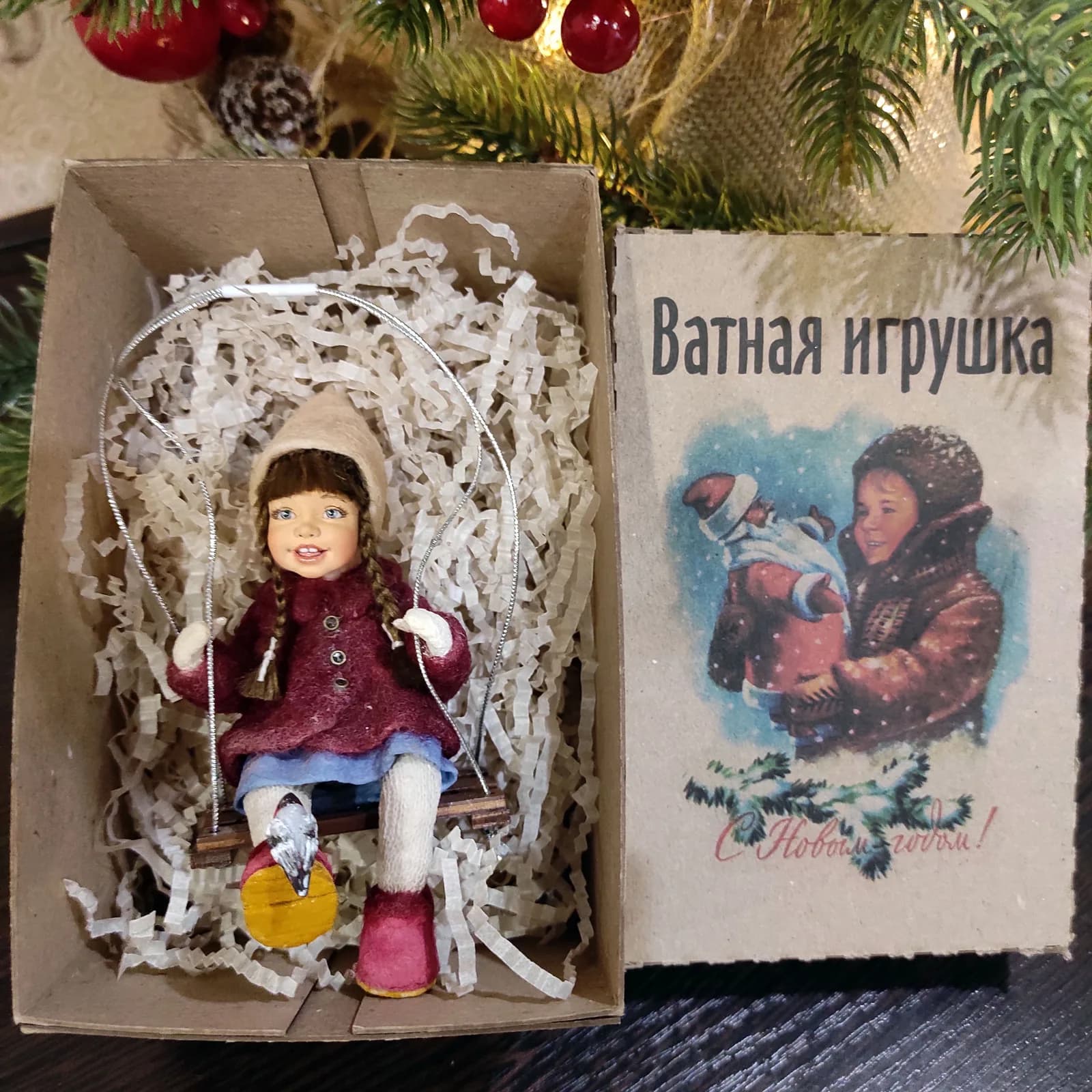Ватная ёлочная игрушка «Елочная игрушка девочка на качелях в бордовом»